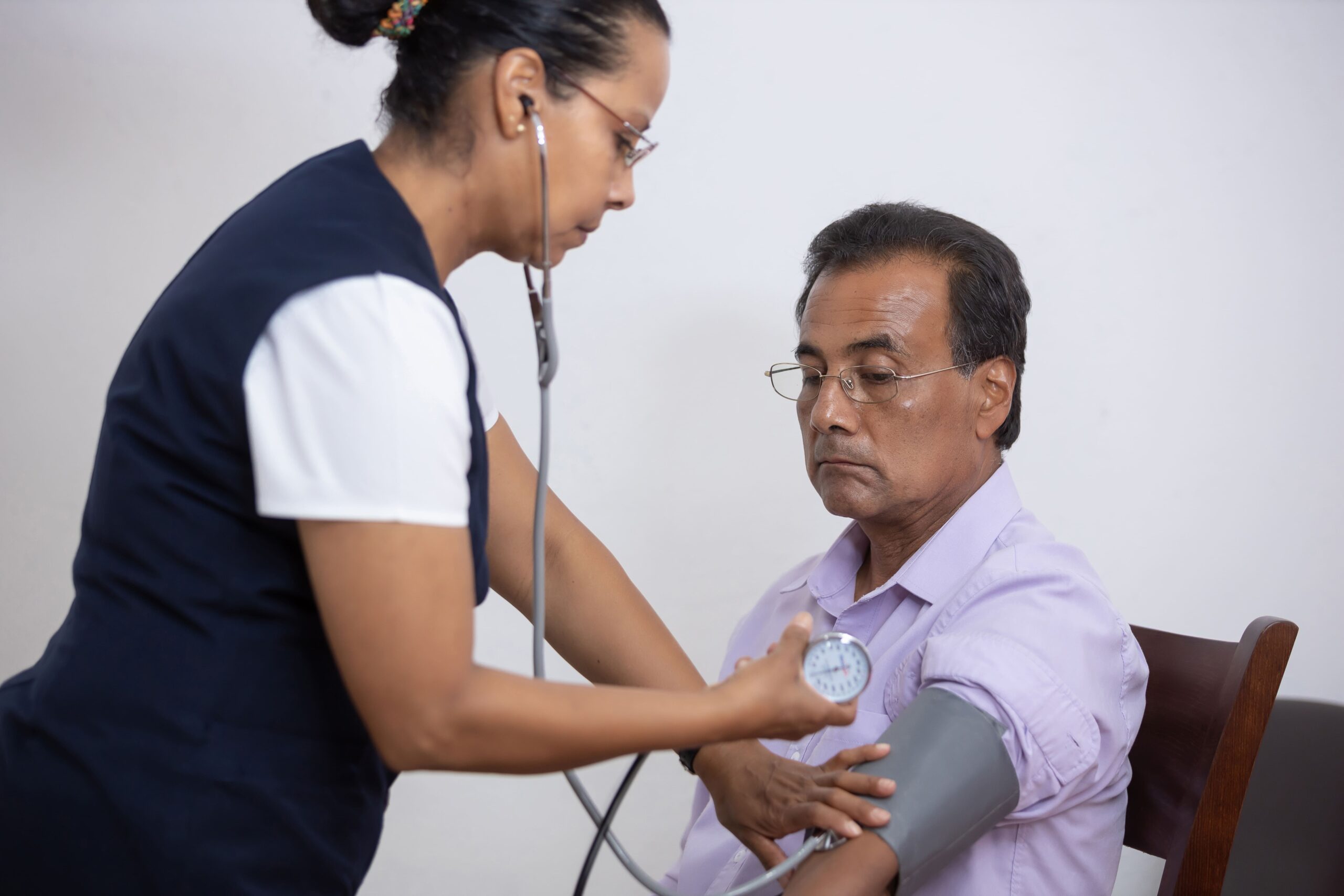 mexican-nurse-measuring-the-blood-pressure-of-the-2025-02-09-20-17-25-utc (2)